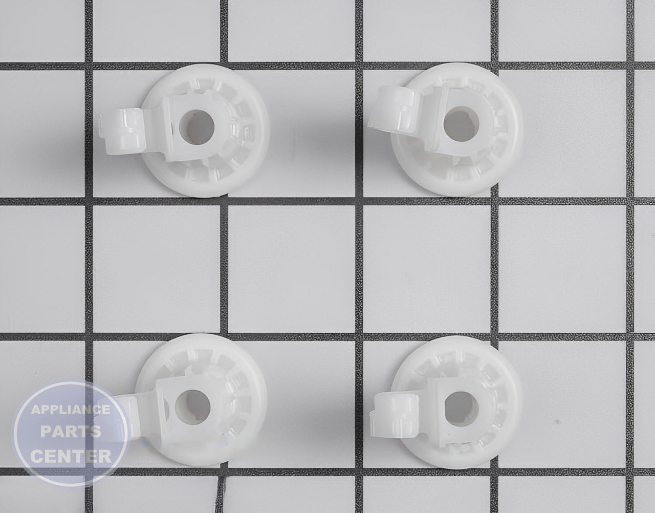 GE DISHWASHER RACK AND ROLLER STUDS 4 PACK WD12X10327 - Detailed view of axle roller shaft wheel components