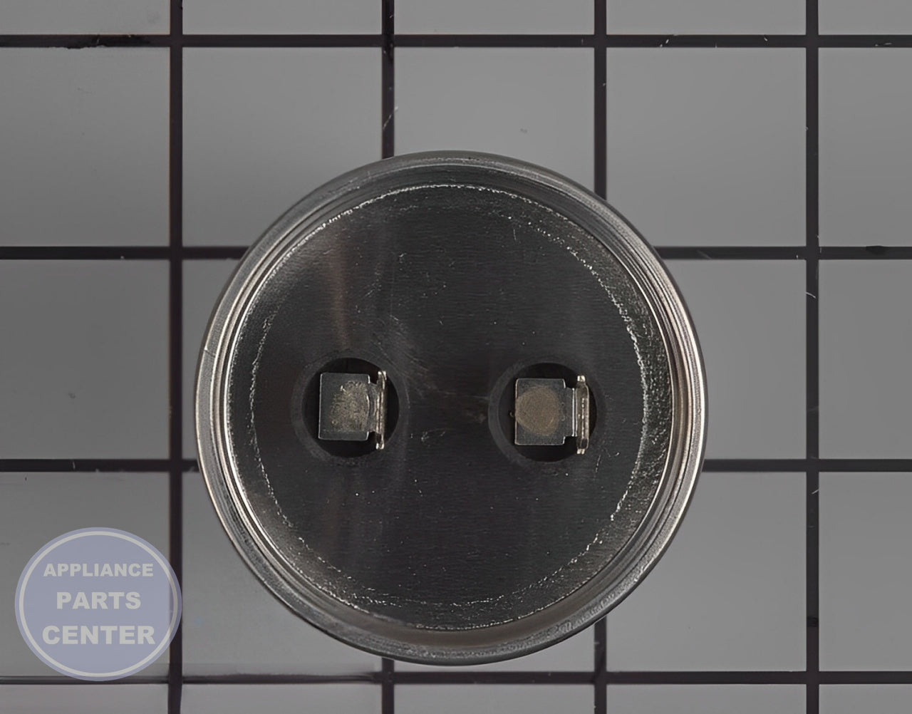 GE CAPACITOR BRACKET KIT WH12X27614 - Side view with capacitor specifications