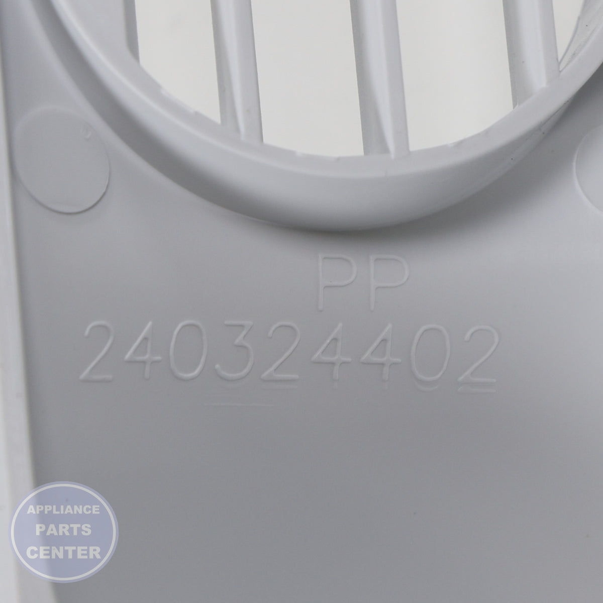WCI GRILLE/KICKPLATE 240324409 - Installation in WCI model showing secure mounting points
