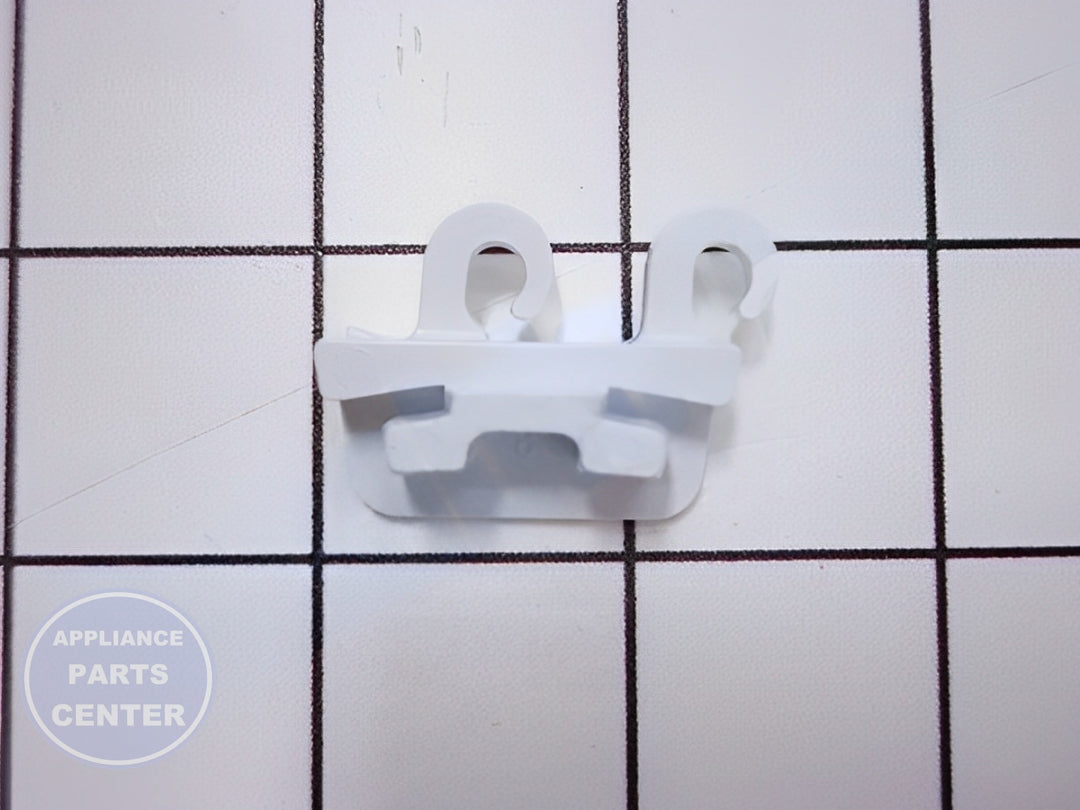 FRIGIDAIRE REFRIGERATOR LEFT HAND DOOR BAR END CAP 5303323481 - Installation in FRIGIDAIRE model showcasing key mounting points