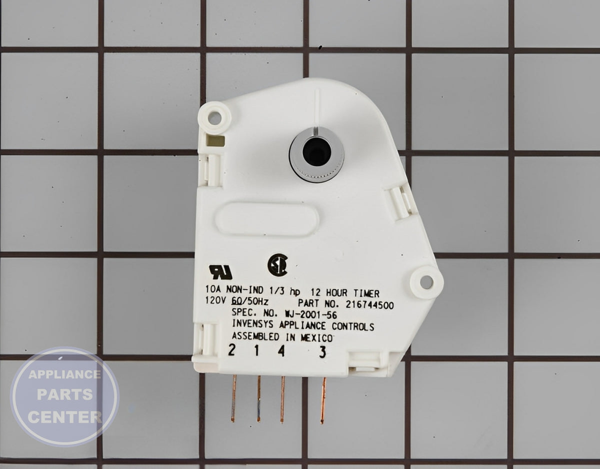 FRIGIDAIRE REFRIGERATOR DEFROST TIMER 5304518034 - Installation in FRIGIDAIRE model revealing mounting points