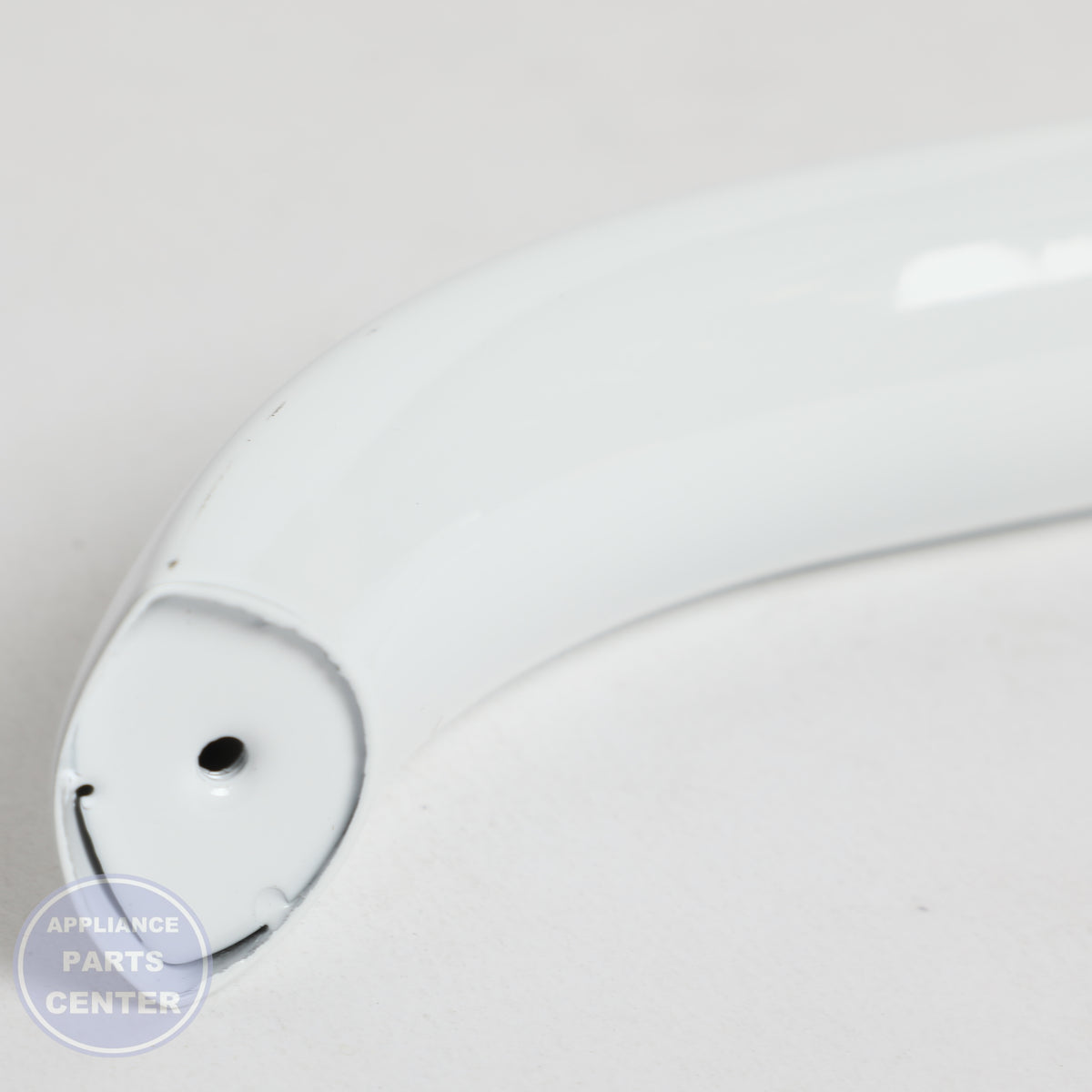 WCI HANDLE ASSEMBLY,WHITE 5304537780 - Installation in specific model showing secure mounting points