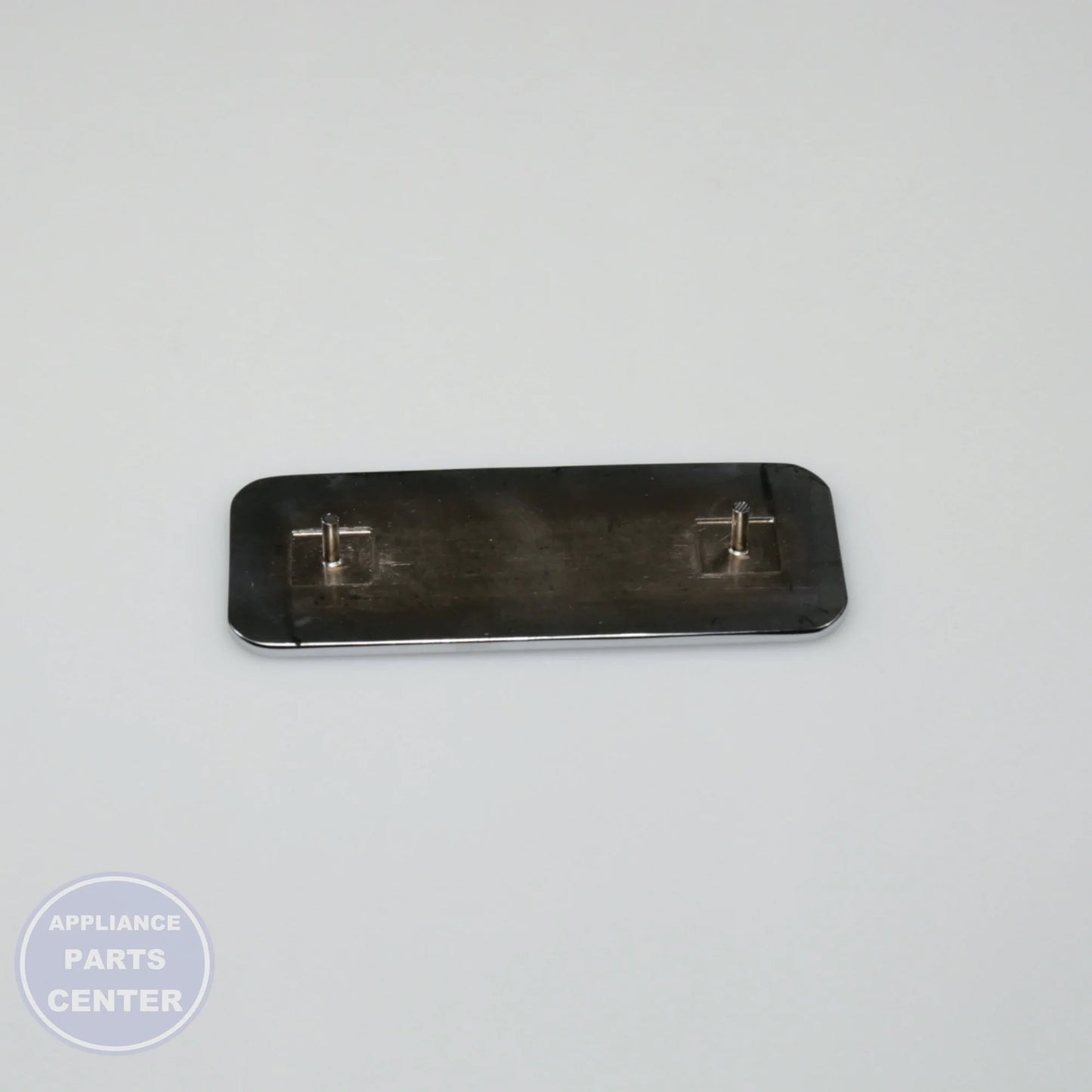 PE010016 LOGO BADGE-BLACK AND CHROME - Detailed view of the stylish black and chrome design