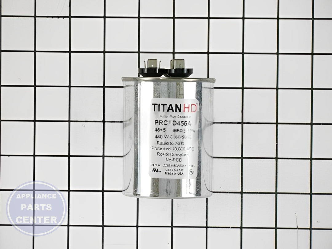 PACKARD TITAN HD RUN CAPACITOR 45+5 MFD 440/370 VOLT ROUND - Installation in [Specific Model] showing mounting points