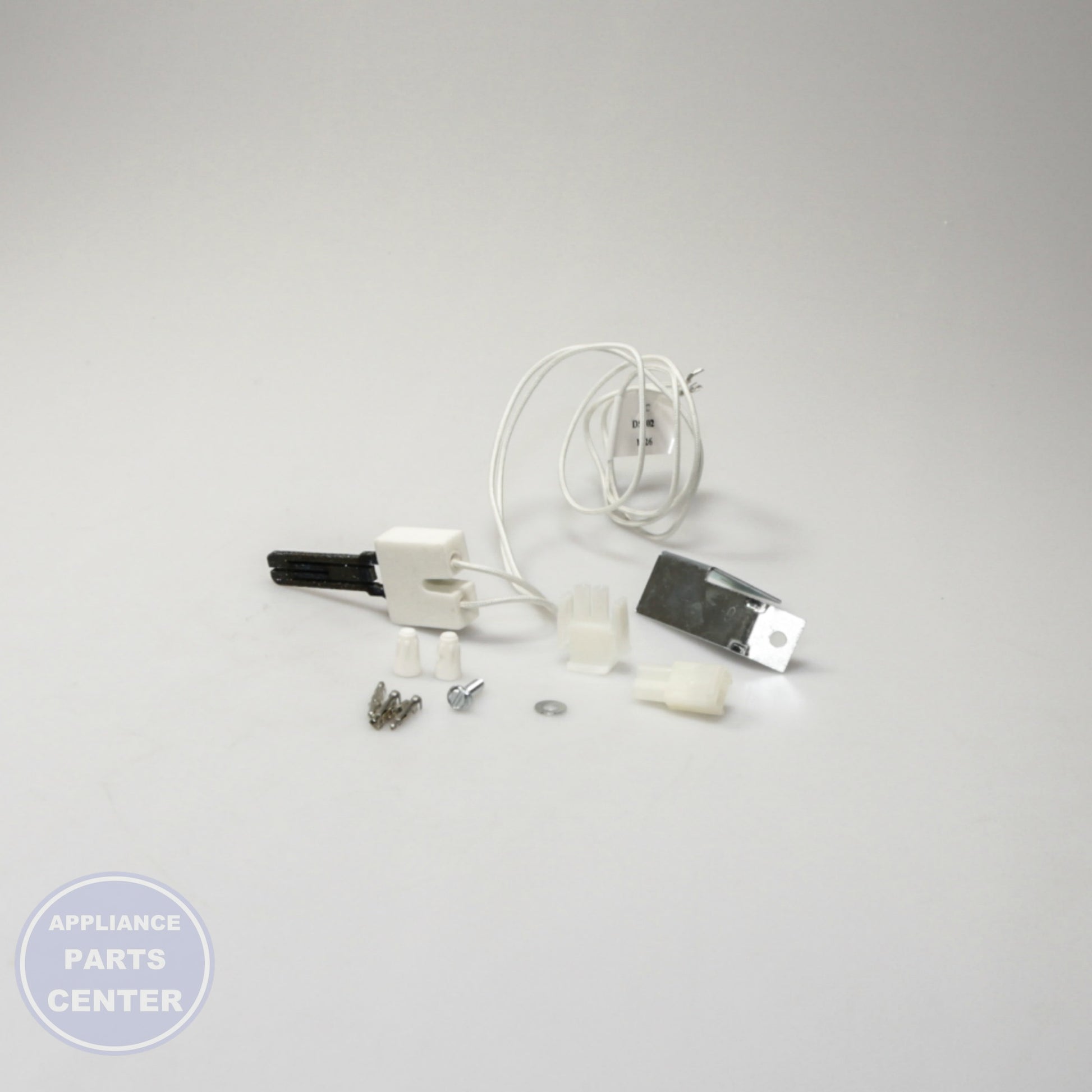 [Brand] UNIVERSAL FLAT FURNACE IGNITOR TJIG402K - Installation in PRO model showing key mounting points