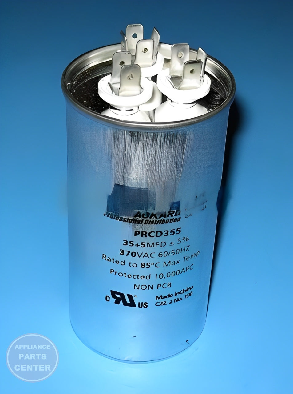 PACKARD RUN CAPACITOR TRCD355 - Installation in [specific model] showing mounting points