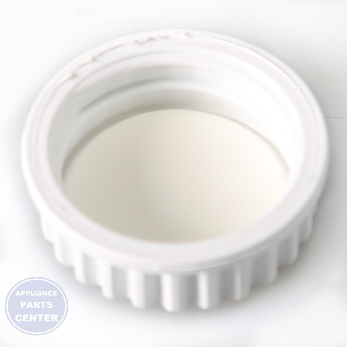 WPL CAP-DRAIN W11023835 - Installation in W10839858 showing easy mounting points
