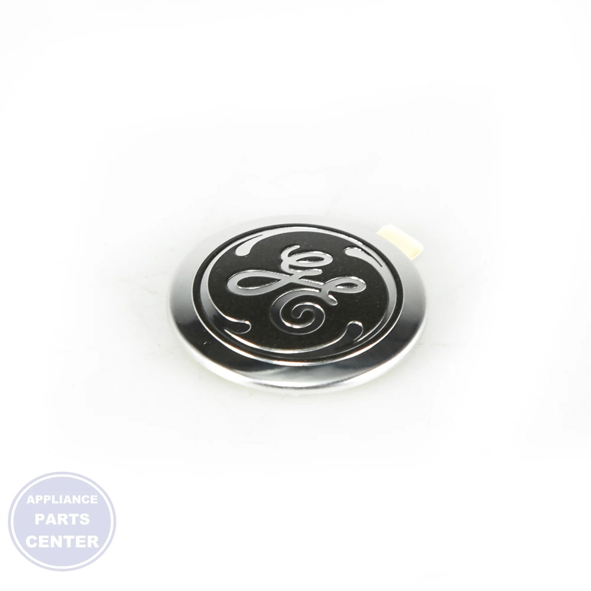 BADGE GE WB02T10589 - Detailed view of the GE badge emblem