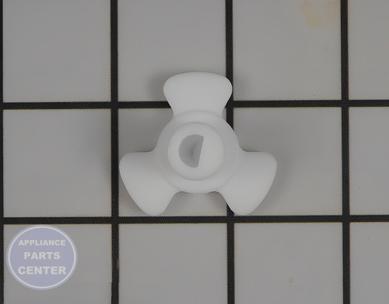 Glass Tray Drive Coupling WB06X10925 - Detailed view of glass tray support roller