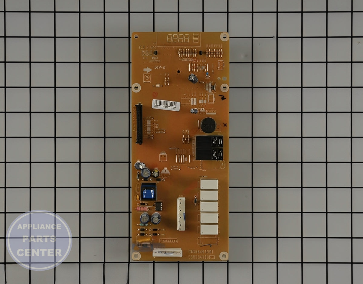 GE OVEN CONTROL BOARD WB27X29801 - Detailed view of circuit board and timer assembly
