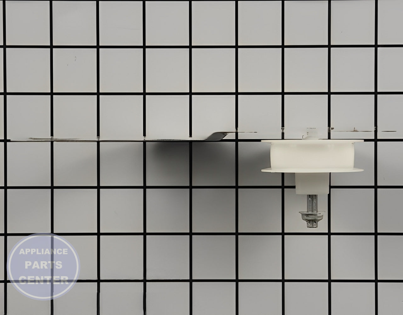 GE IDLER ASSEMBLY (RIGHT HAND) WE12X10019 - Detailed view of precise belt guidance
