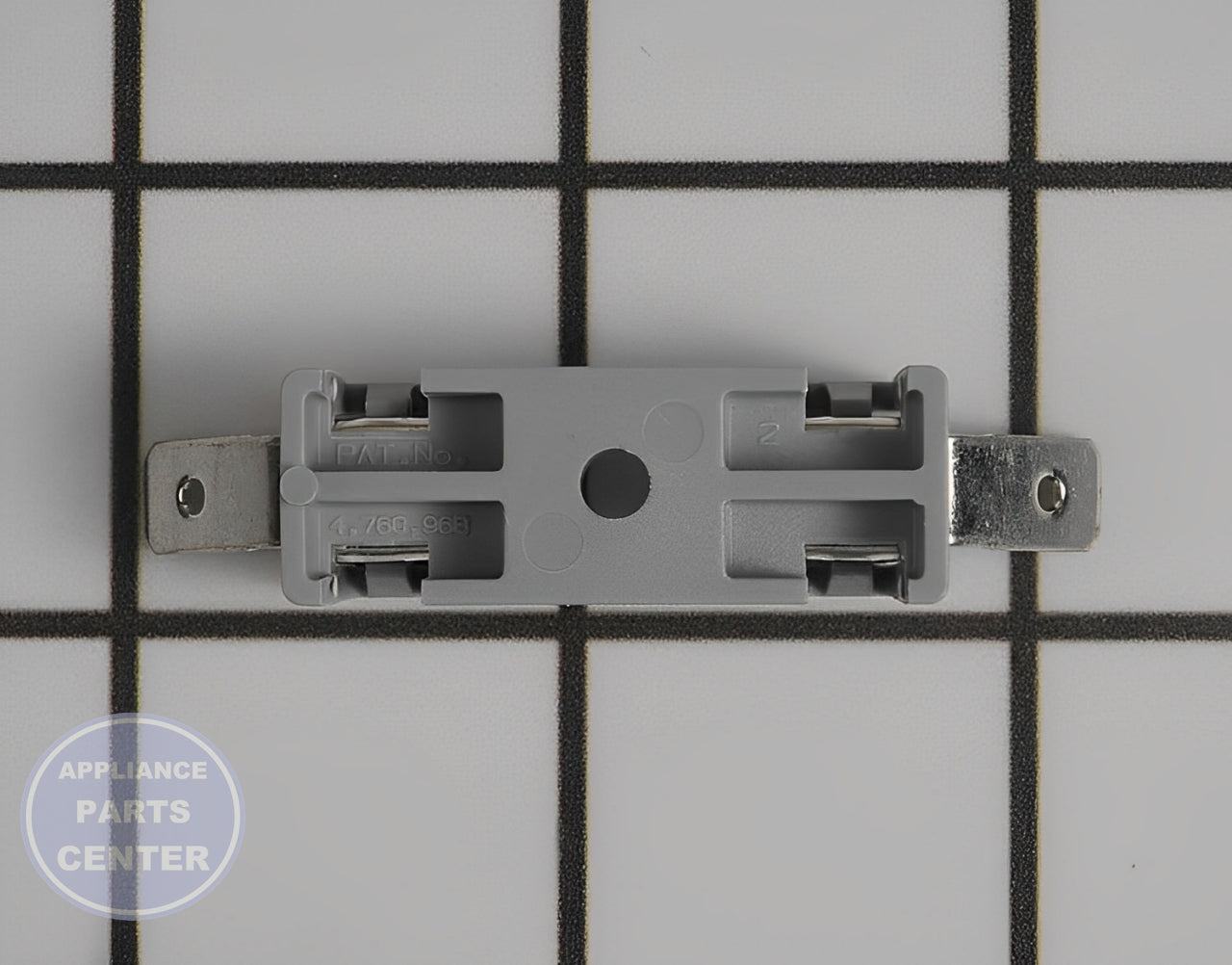 GE WASHER FUSE HOLDER WE1X21955 - Detailed view of thermal fuse and breaker mechanism