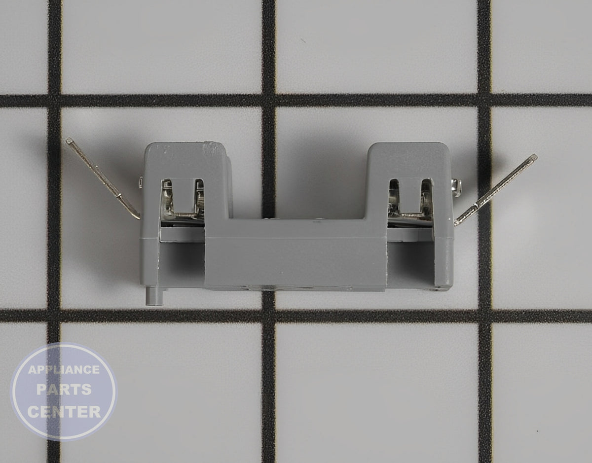 GE WASHER FUSE HOLDER WE1X21955 - Side view with built-in fuse and breaker