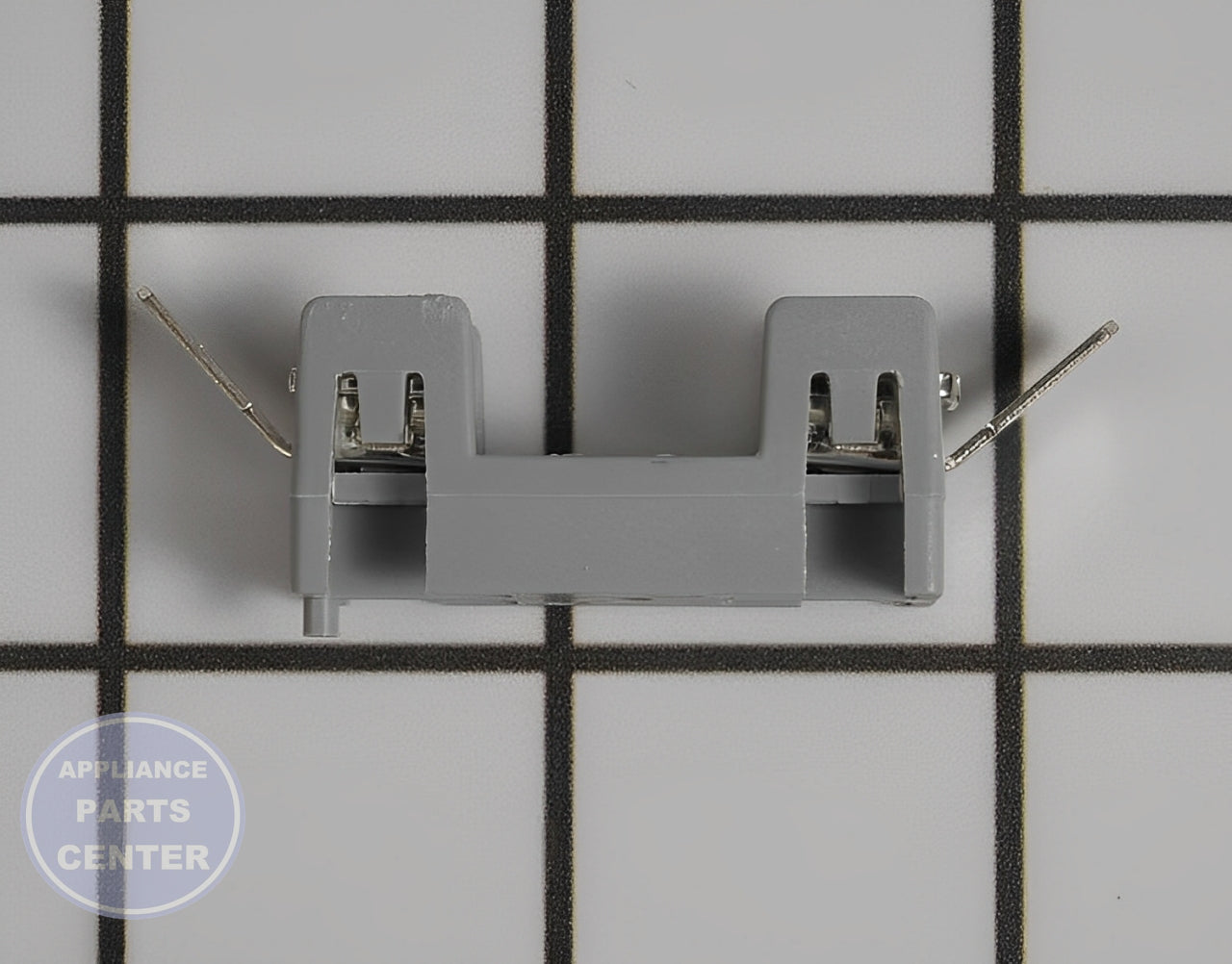 GE WASHER FUSE HOLDER WE1X21955 - Side view with built-in fuse and breaker