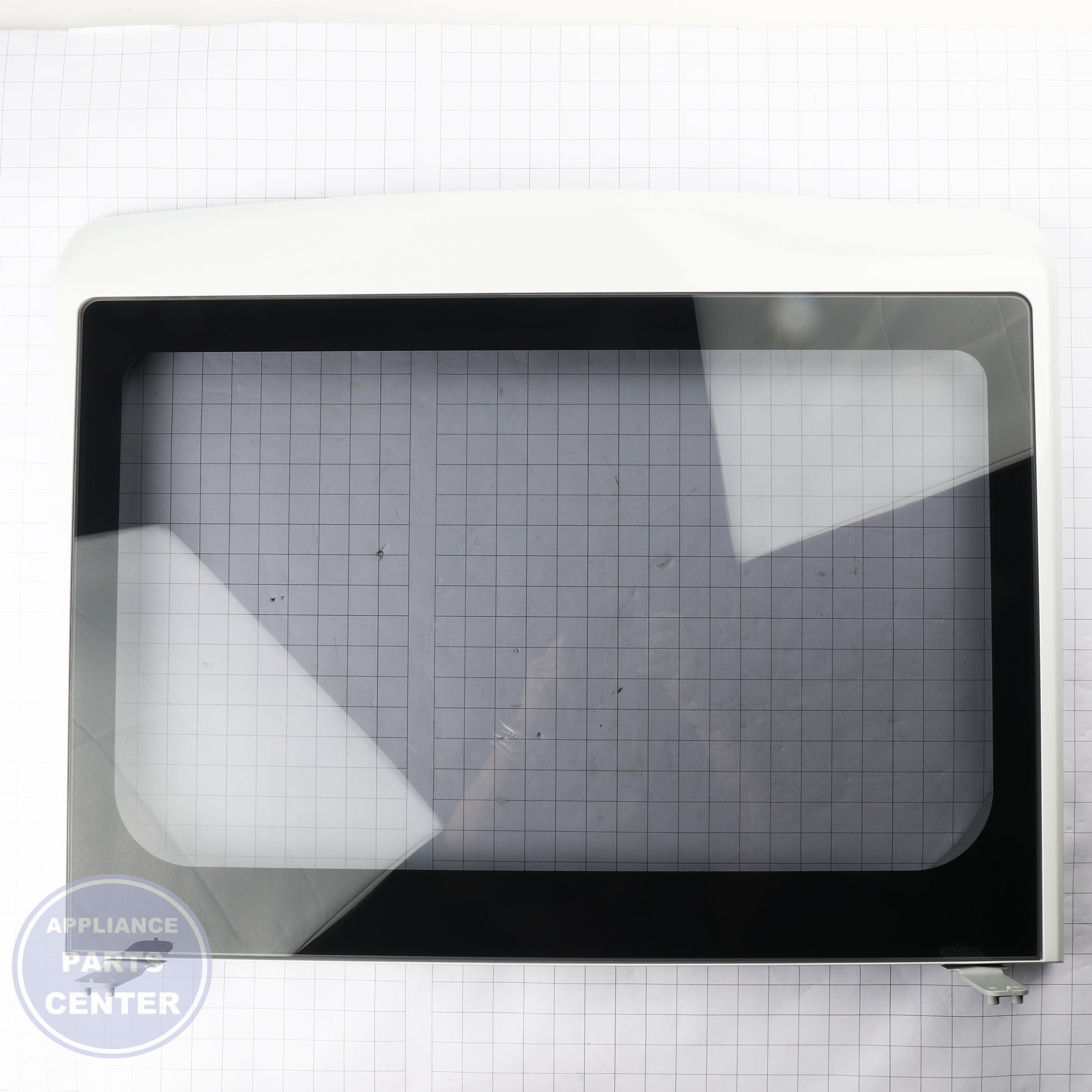 GEH GLASS FRAME LID TL WASHER WHITE WH10X35297 - Installation in GEH model showcasing secure mounting points