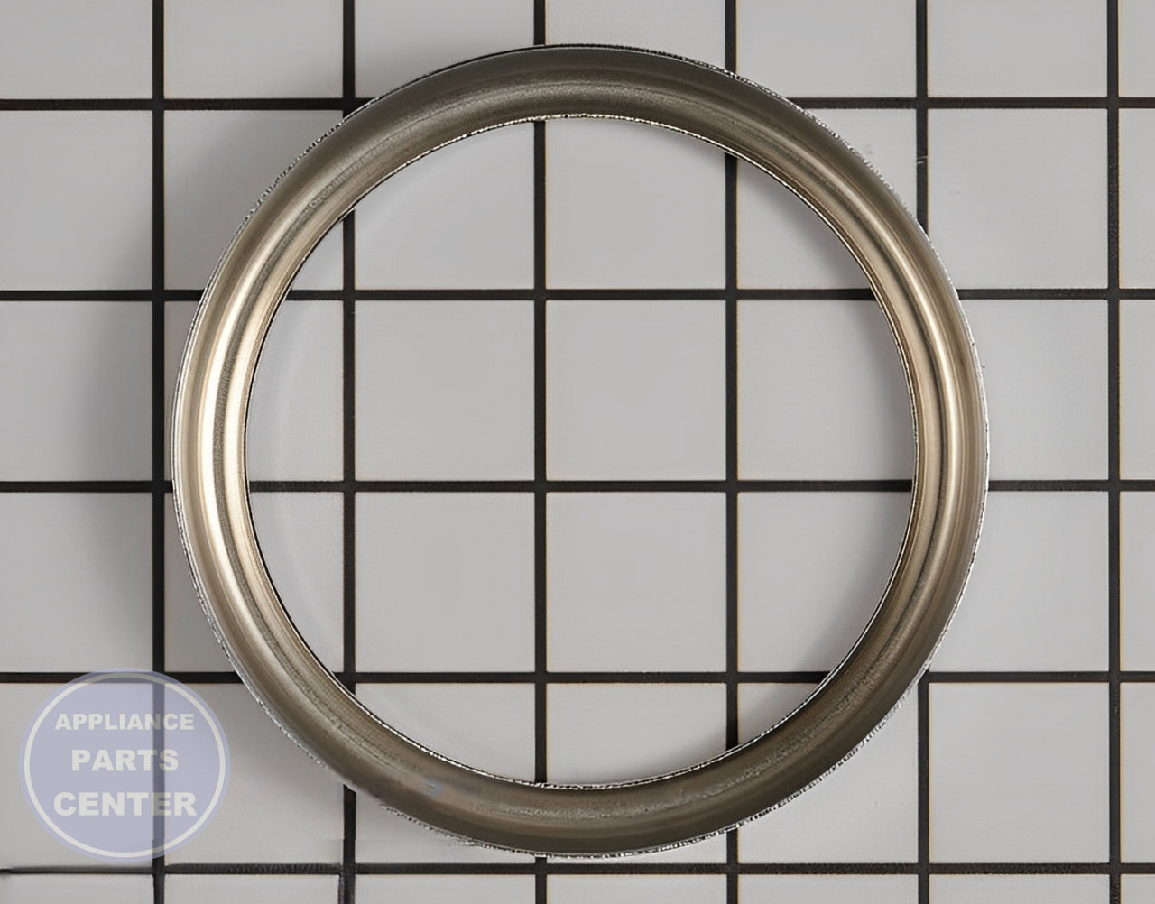 WHIRLPOOL DRIP RING WP240285 - Detailed view of the axle, roller, shaft, and wheel