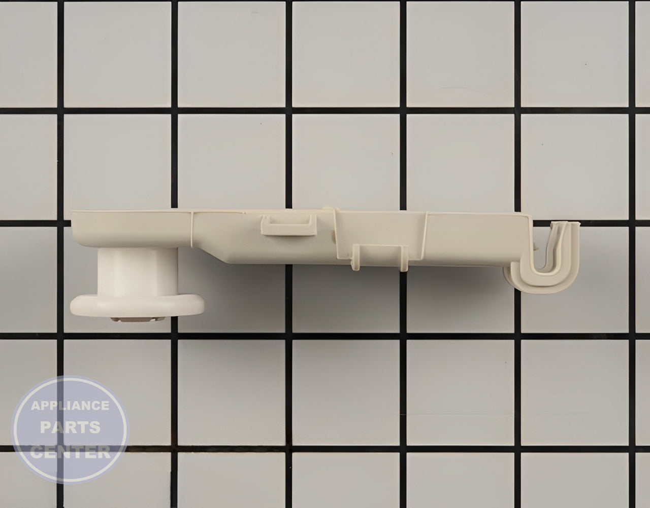 WHIRLPOOL ROLLER ASSEMBLY WP8268655 - Detailed view of the axle, roller, shaft, and wheel