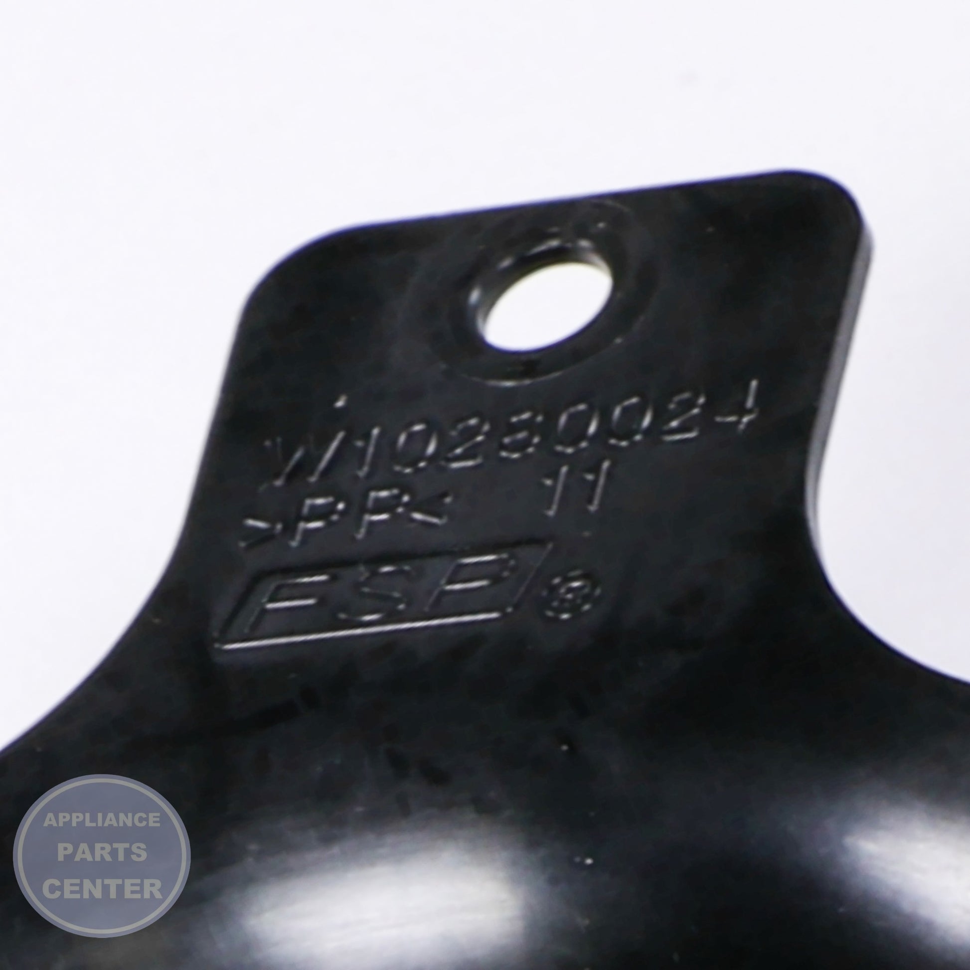 WPL RETAINER WPW10280024 - Installation in Whirlpool model showing secure mounting points
