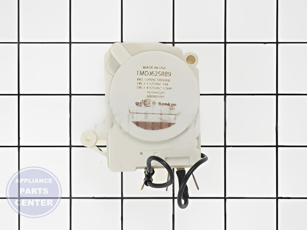 GE DEFROST TIMER WR9X480 - Installation in GE model showcasing mounting points